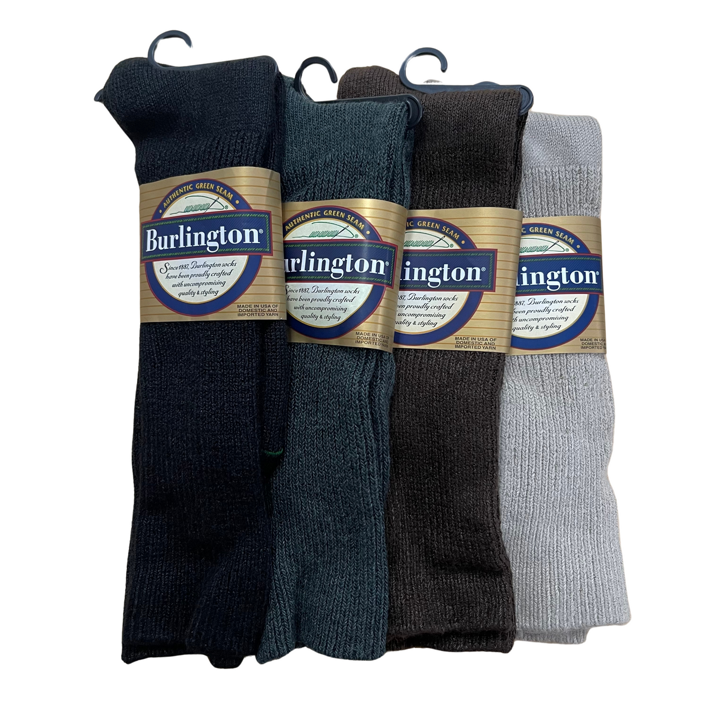an overhead shot of 4 pairs of socks lined up next to each other. The BB201 Casual Acrylic Sock in all 4 colors, black, Charcoal Heather grey, Chocolate brown, and Chino khaki.